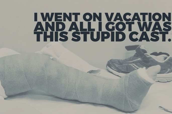 Sepia tone image of a child's leg in a cast up to the mid thigh, with a single sneaker in the background. Text overlaid on the image says: I went on vacation and all I got was this stupid cast.